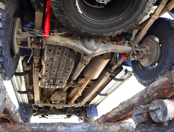 photo view below hte car, showing car differential