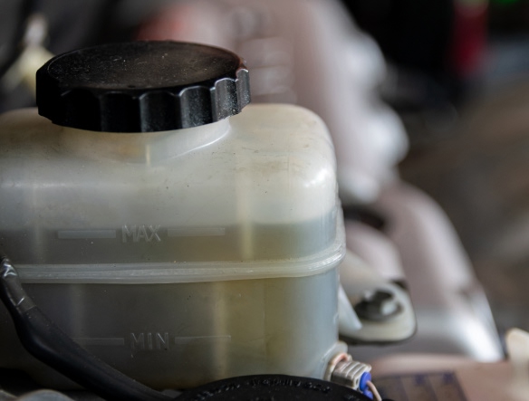 close up of a brake fluid canister